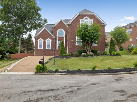 Classic all-brick construction gives 608 Banbury Place a timeless curb appeal and lasting quality. Mature trees and a generous lot set the tone for the peaceful retreat waiting inside.